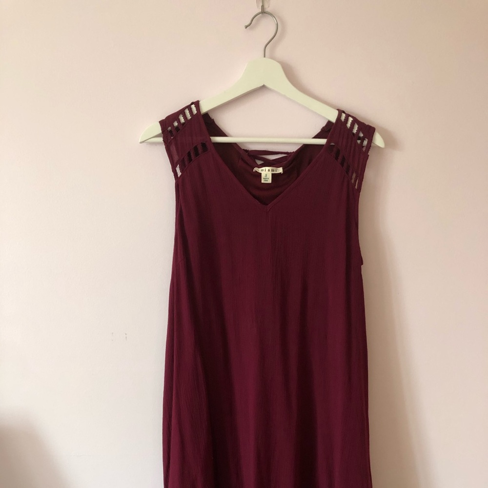 Francesca’s burgundy flowy dress